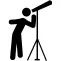Man looking by a telescope