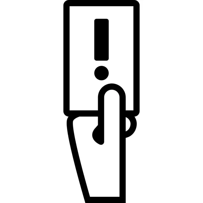 Hand showing yellow soccer card