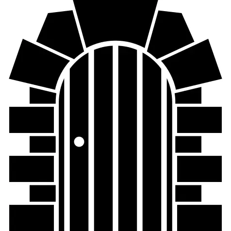 Wood closed door with stones arch frame