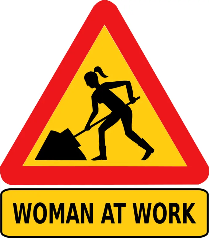 Woman at work road sign
