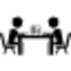 Students reading sitting in a library