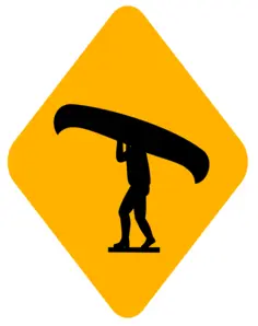 Man with canoe sign