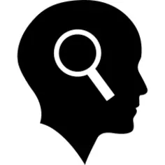 Bald head with magnifying glass