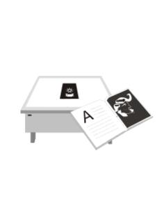 Desk and book next to it vector graphics